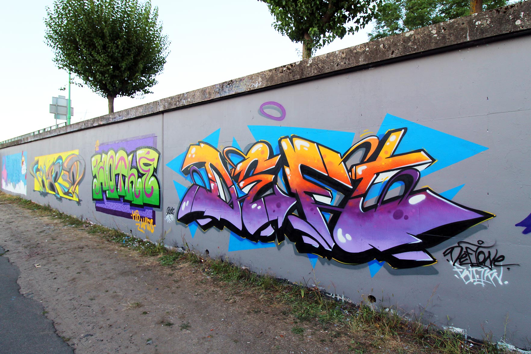 mur-graffiti-longues-street-art